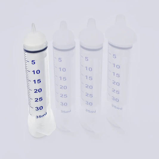 Extra small threaded syringe feeding nipple for toy breed puppies and kittens.